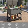 Rolling outdoor cooler cart equipped with dual side lids, foldable wing shelves and omnidirectional casters, with built-in bottle opener